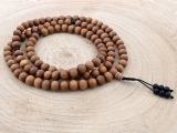 Mala Gebetskette - Sandelholz 10 mm mit Onyx Perlen